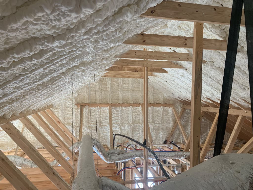 High-density spray foam applied to attic trusses and gable walls in Pooler GA