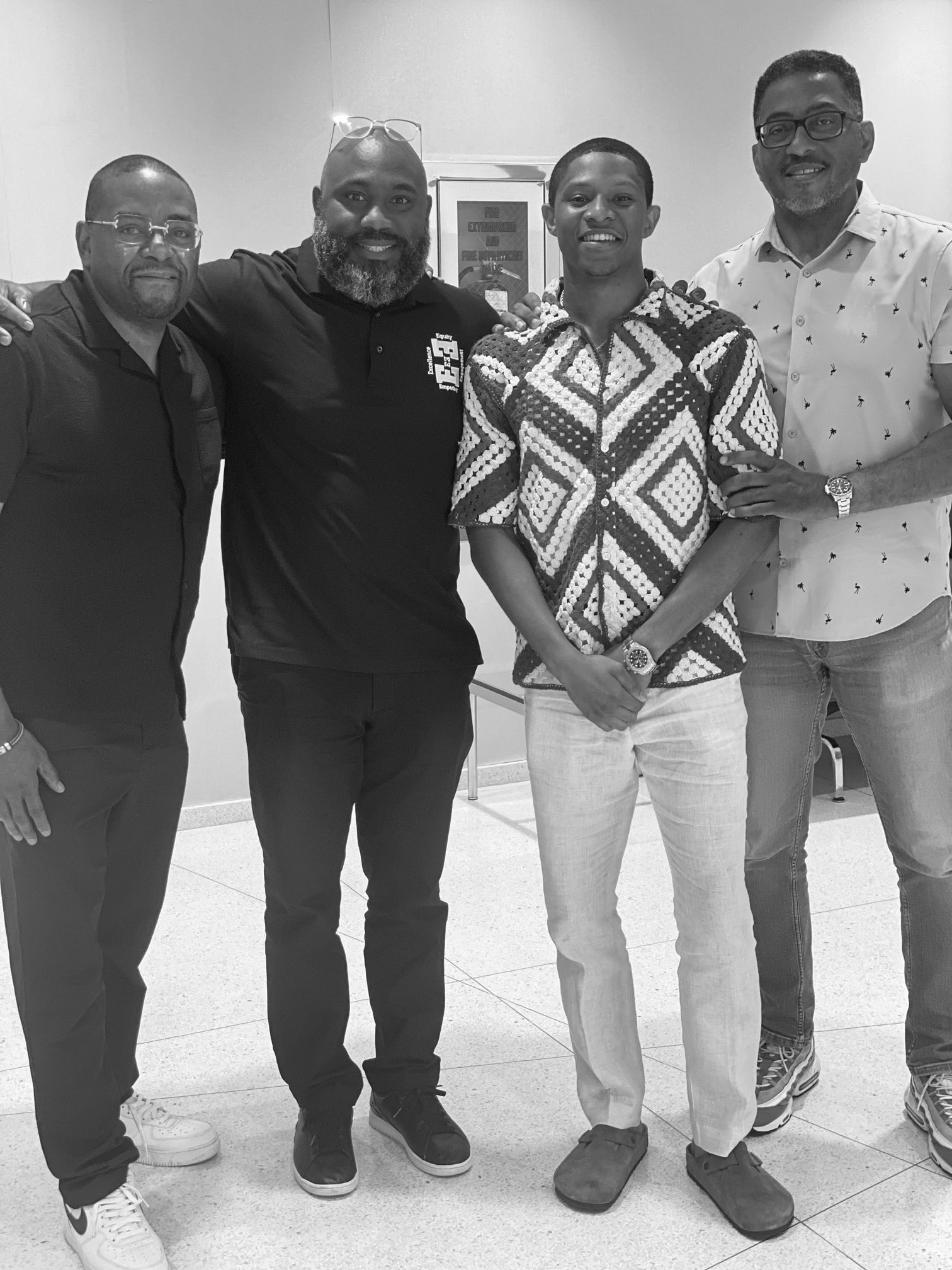 Brendan T. Mims collaborating with fellow education leaders as a team