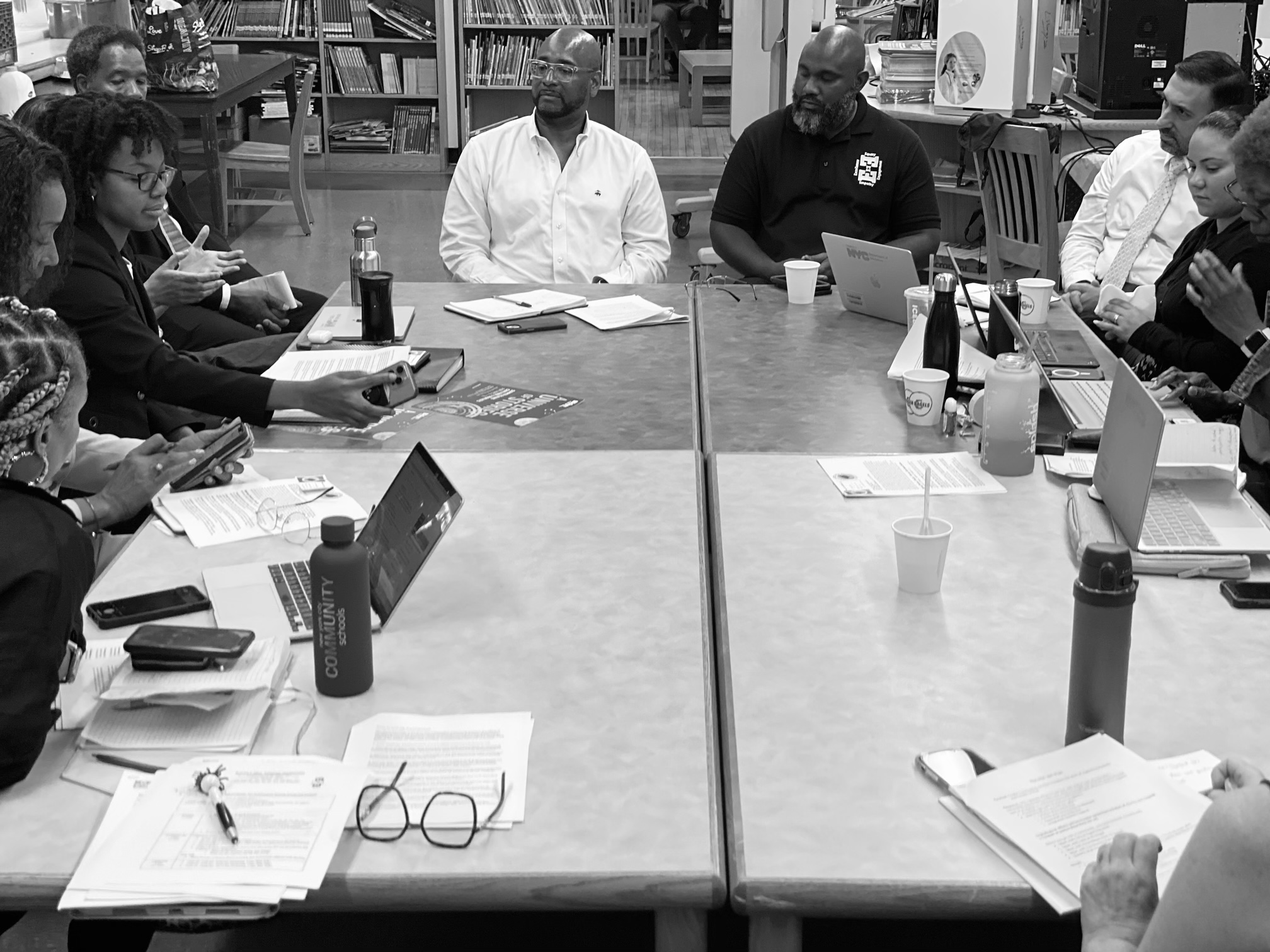 Brendan T. Mims in collaborative planning with educational leaders