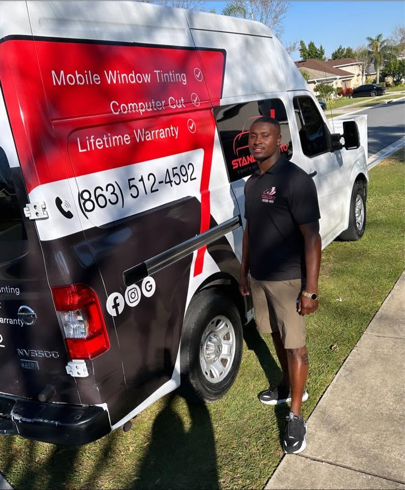 Stanley Beckford with the branded mobile tint van in Lakeland, FL