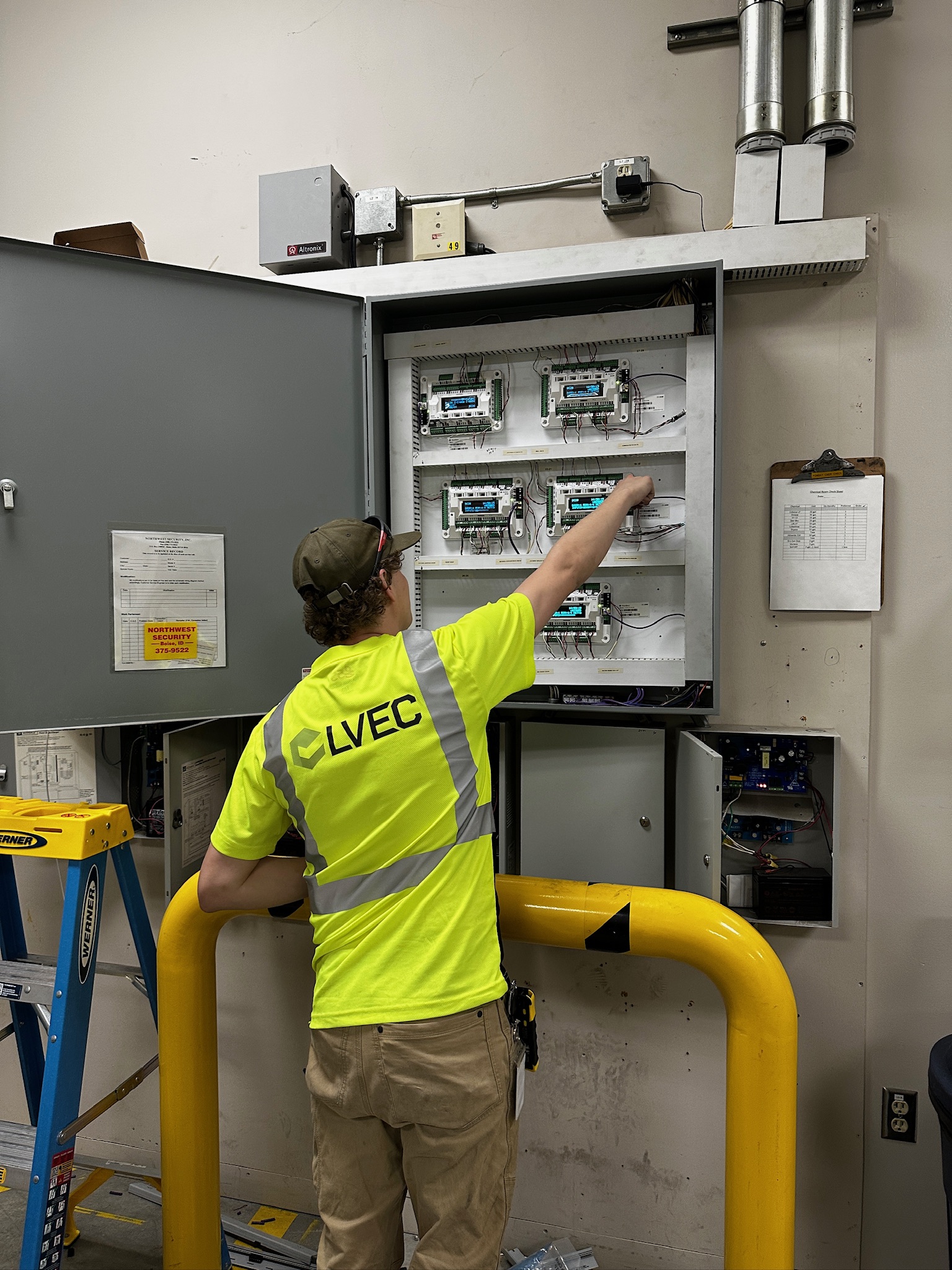 LVEC technician servicing commercial access control panel in Utah
