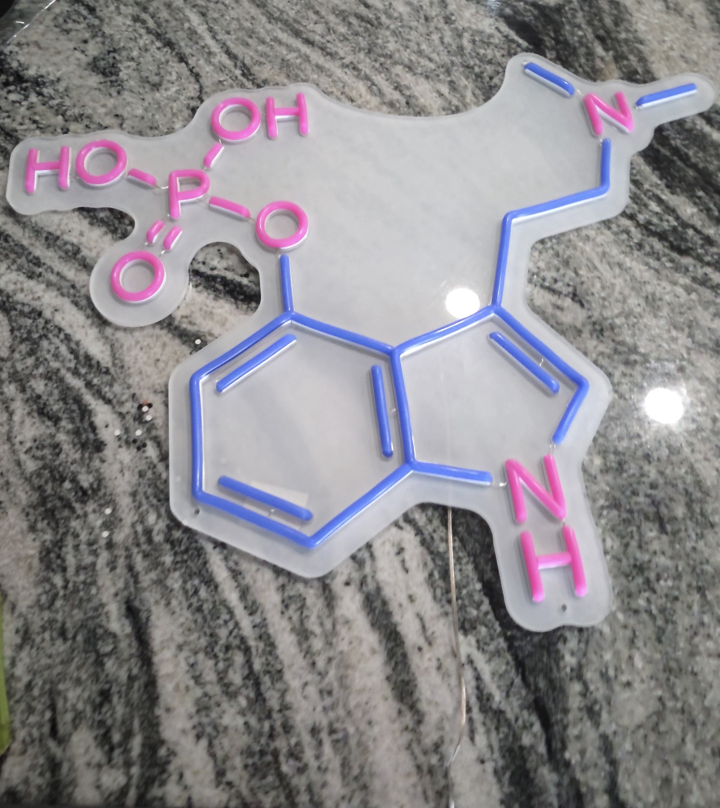 Freshly unboxed sign with protective laser shipping film