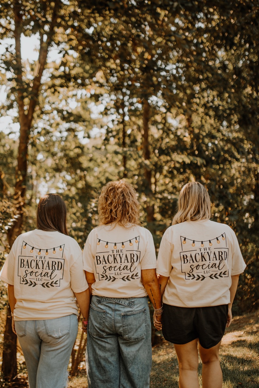 The Backyard Social LLC team shirts with string light emblem