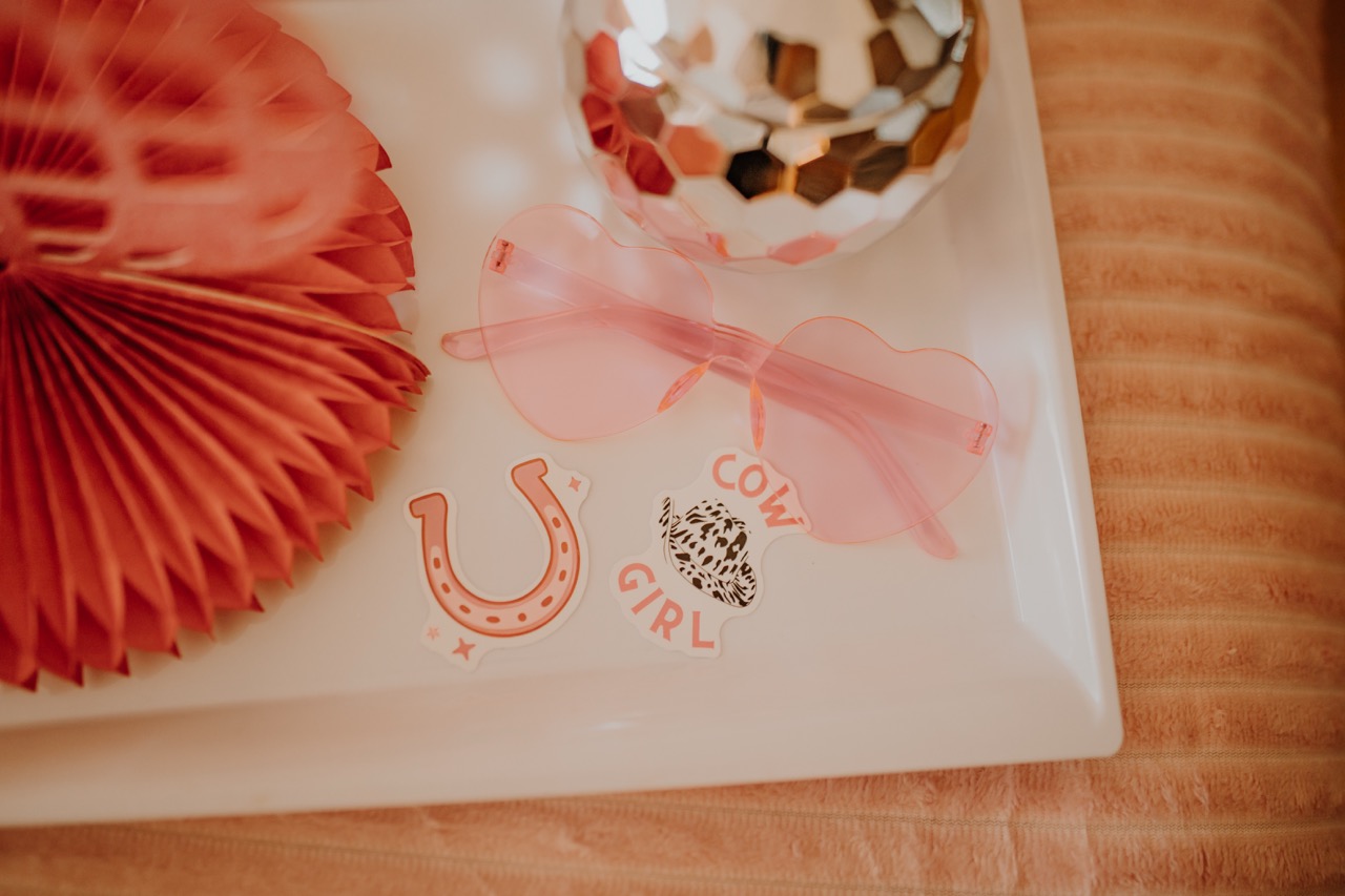 Tray detail with heart sunglasses, horseshoe and cowgirl stickers, and disco ball cup