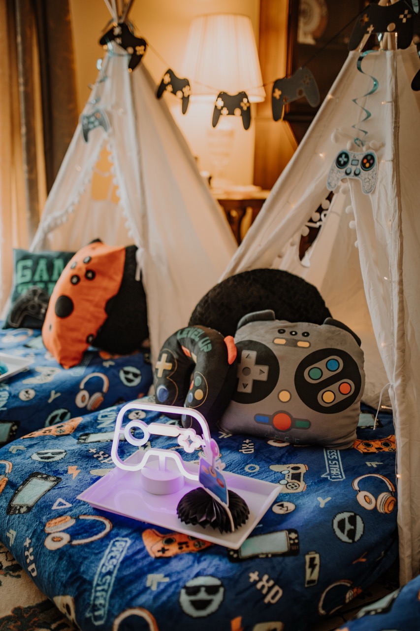 Level Up gamer sleepover teepees with controller pillows, gaming bedding, and illuminated LED controller light
