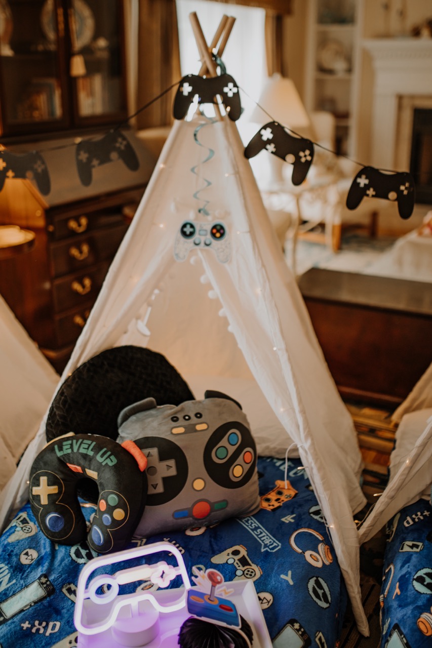Level Up gamer teepee with retro controller cushions, gamer blanket, and neon controller light