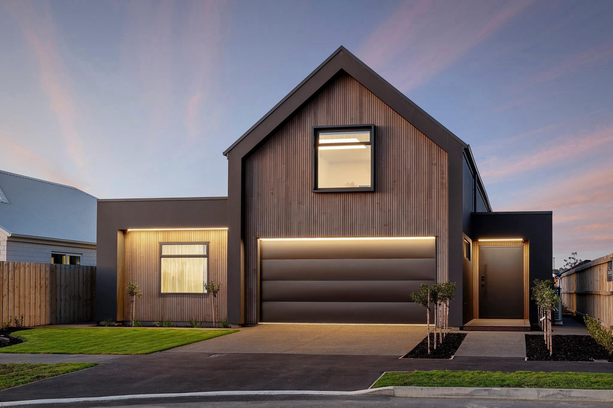 Modern architectural home in Christchurch at sunset