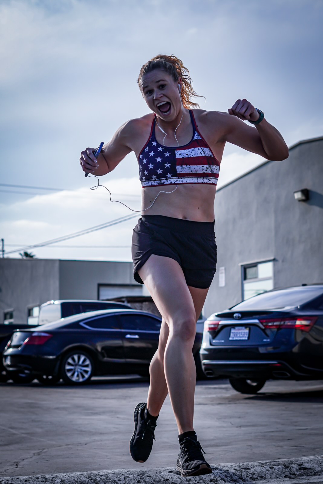 Lauran Orrin sprinting outdoors with full energy and power