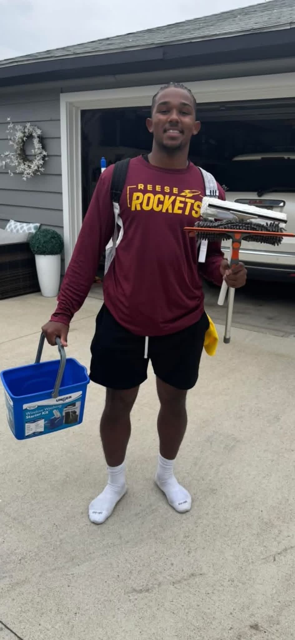 Tre Johnson, owner of Crystal View Window Cleaning, ready for a day of work