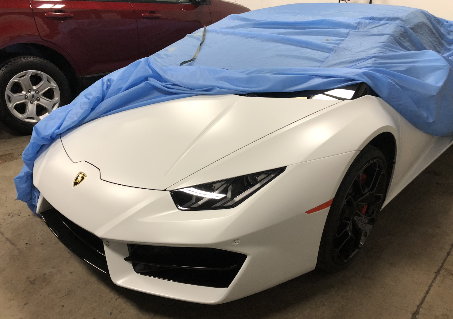 White Lamborghini Huracán Coupe with full-front PPF and ceramic coating at Miami Glow Customs