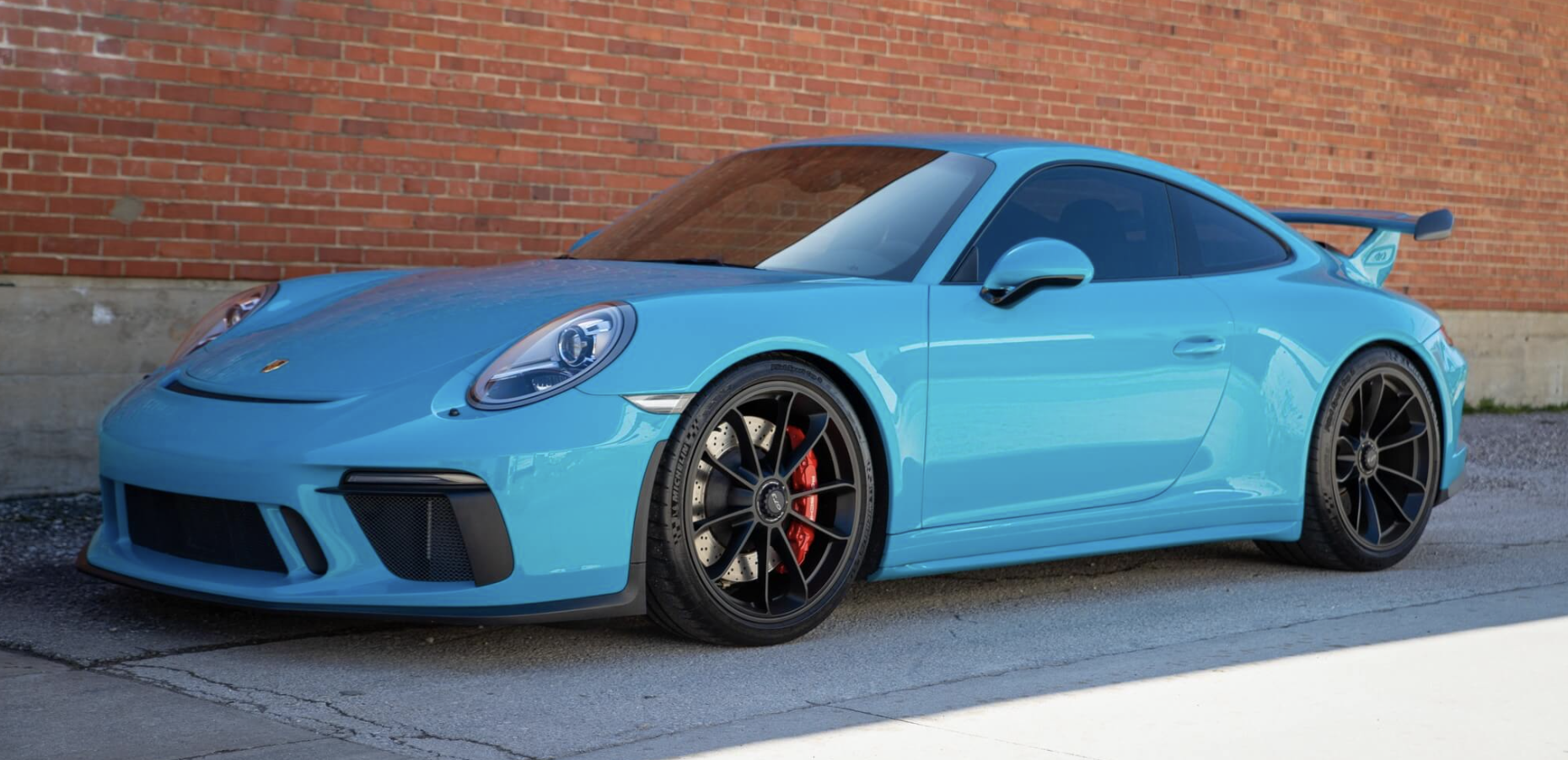 Porsche 911 GT3 in Miami Blue protected with The Big 3 package at Miami Glow Customs