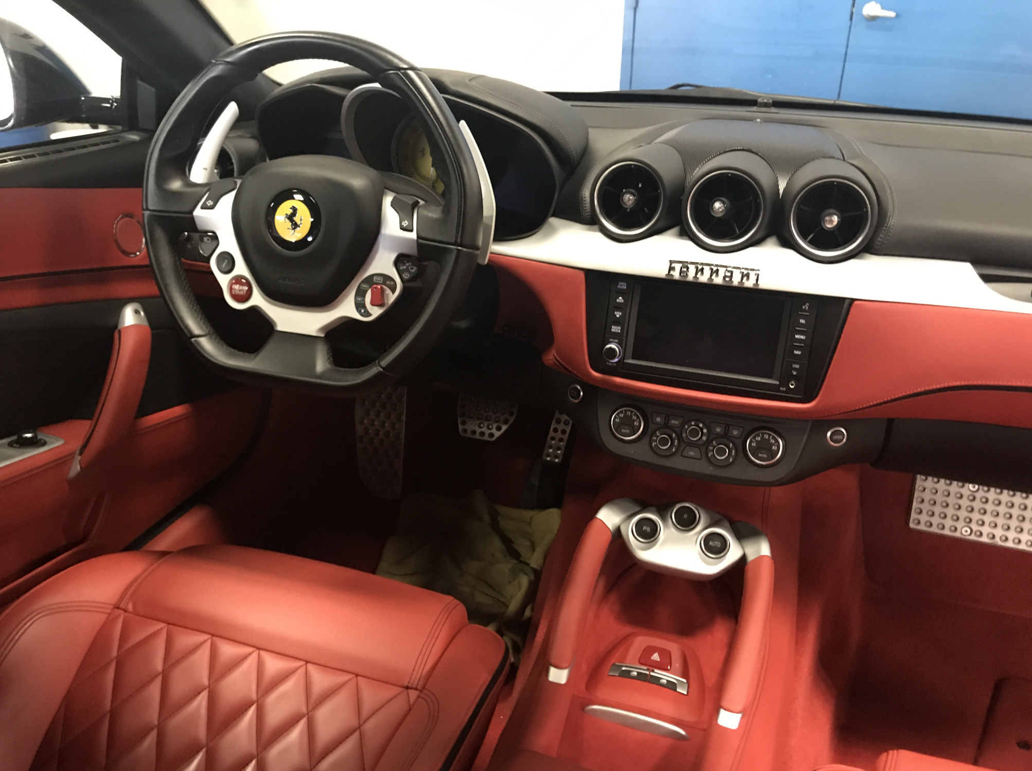 Ferrari FF interior cockpit protected with GeoShield ceramic window tint at Miami Glow Customs
