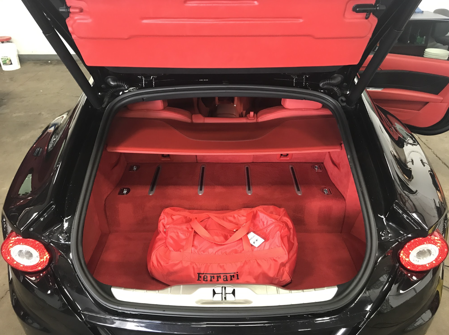 Ferrari FF with bespoke leather luggage suite, interior ceramic protection at Miami Glow Customs