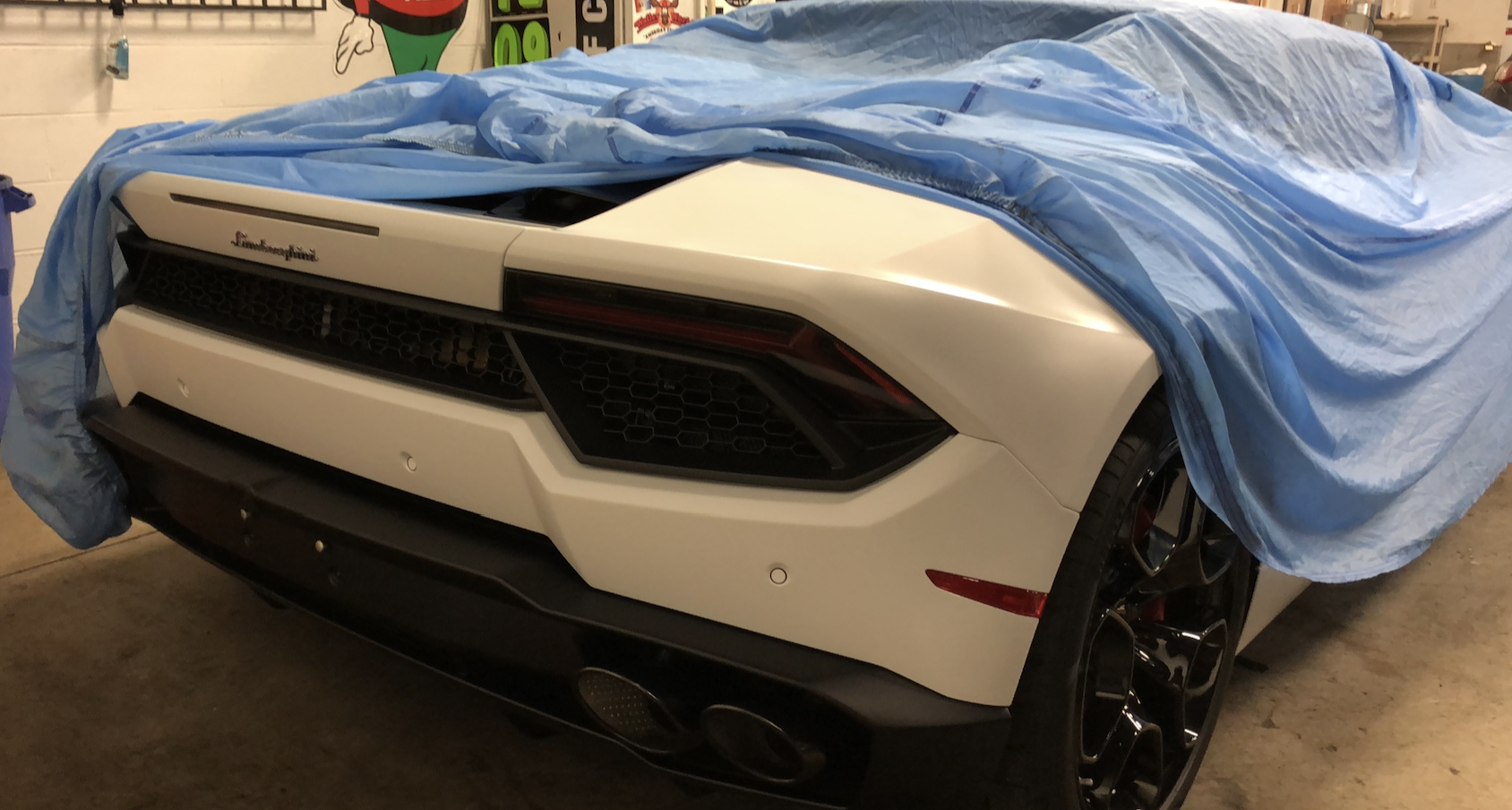 Lamborghini Huracán Coupe — Rear diffuser wrapped-edge film protection against exhaust debris