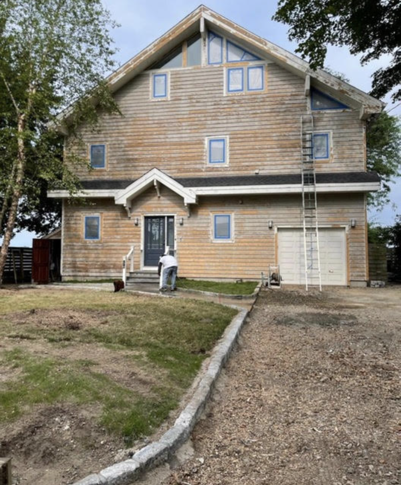 Sanding and prepping cedar clapboard for exterior painting