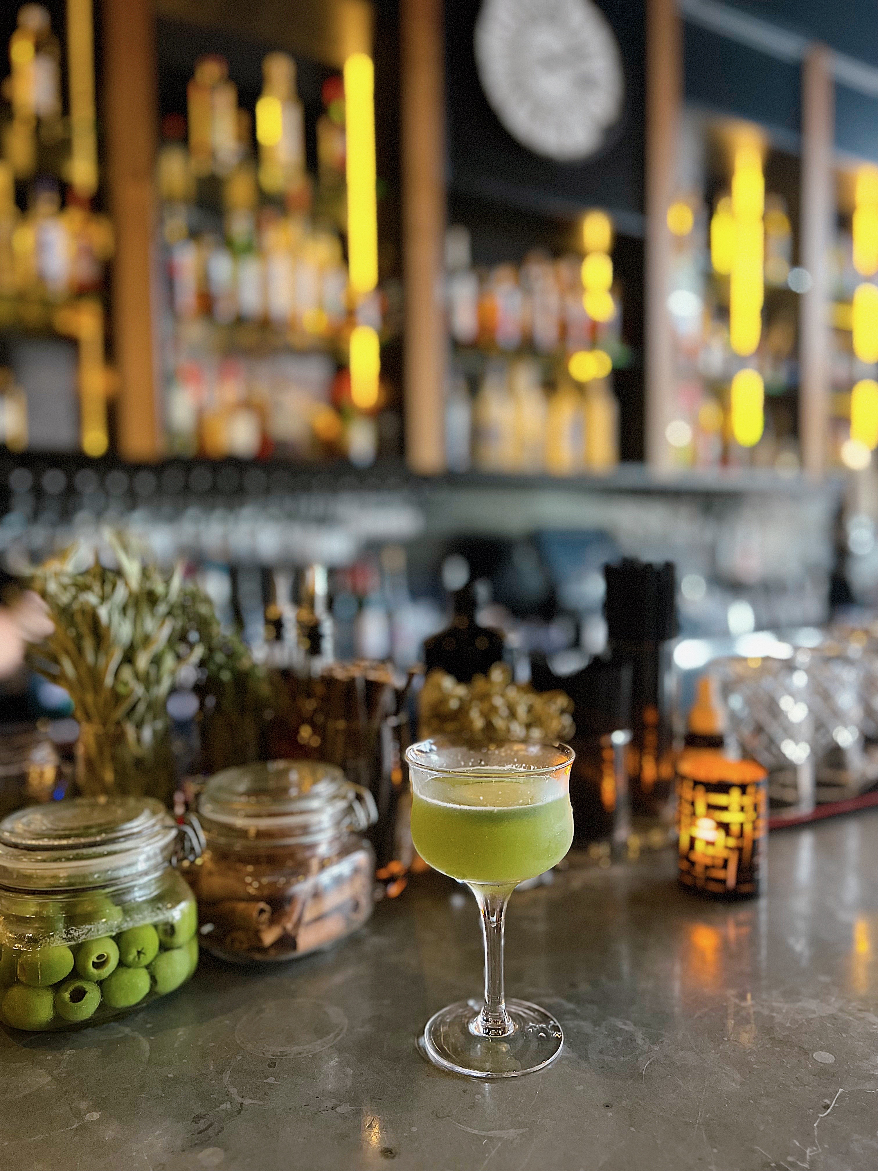 Intimate and warm bar counter atmosphere at Et Voilà French Bistro