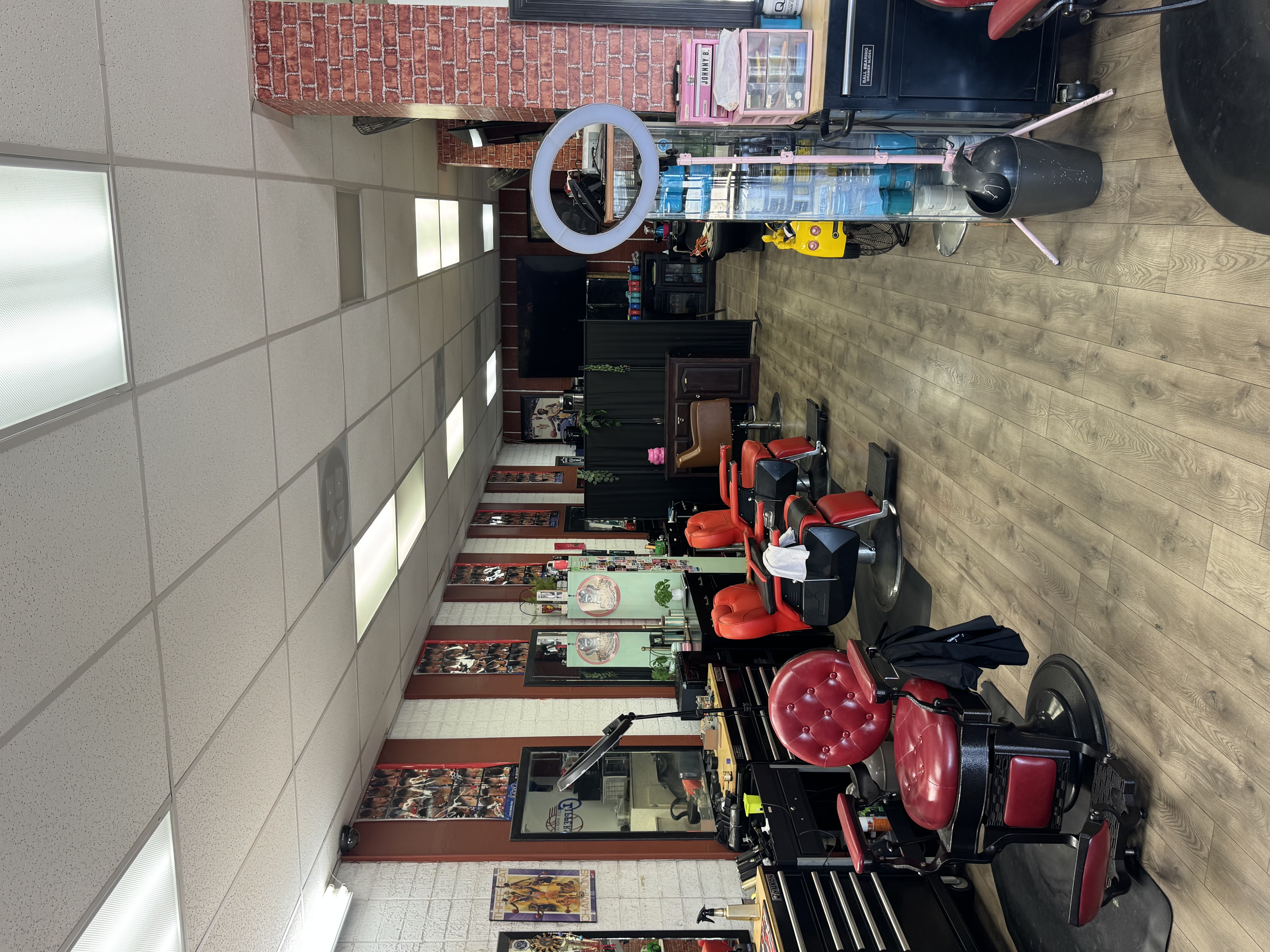 R&C Barbershop interior view showing barber stations and chairs in Montebello, CA
