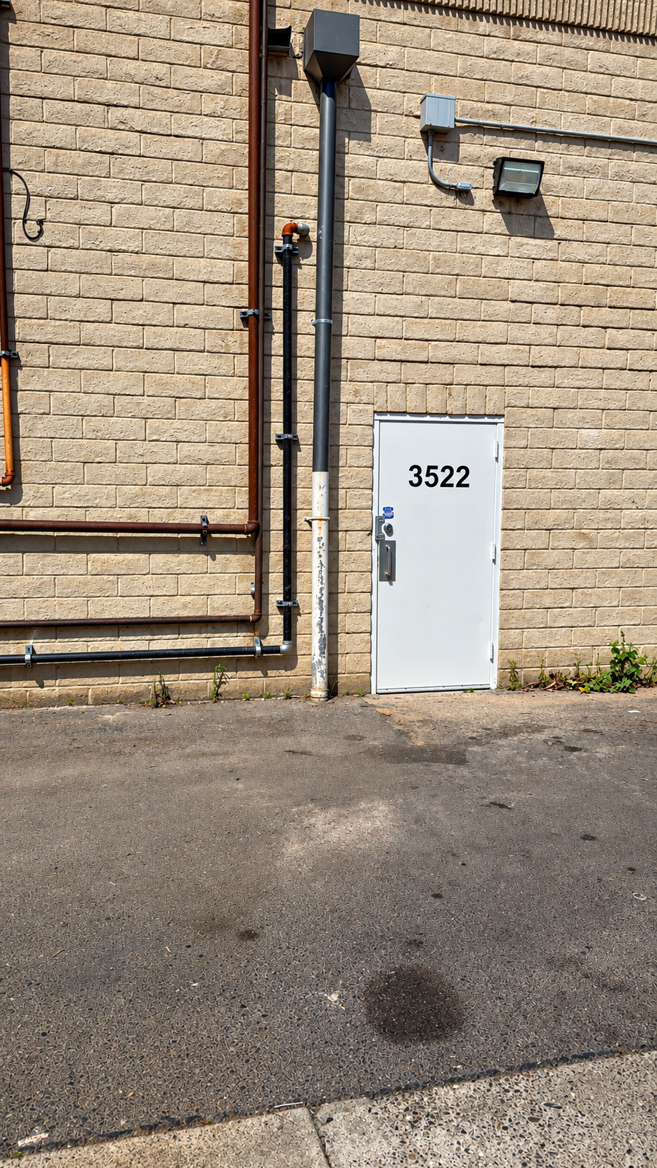 Commercial building back service entrance ready for cleanup and debris haul-off