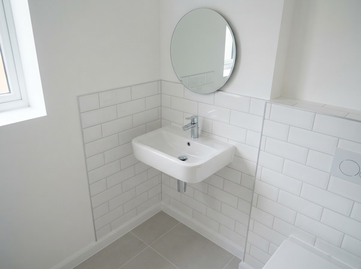Cloakroom & Toilet — Corner basin & mirror