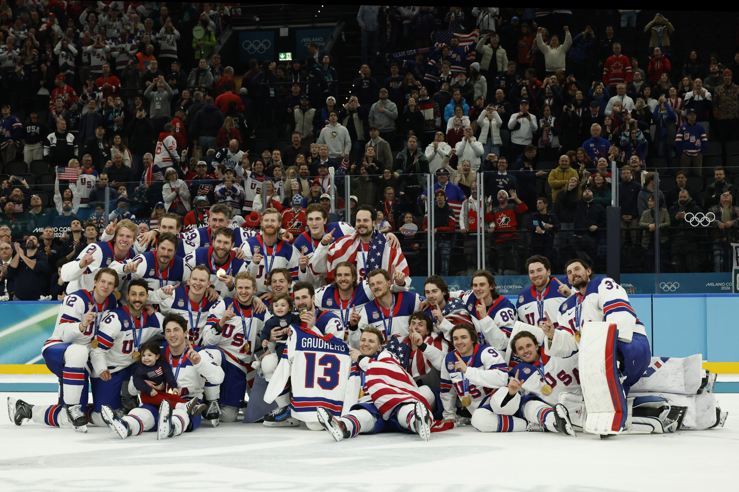 Championship hockey team celebrating together on the ice