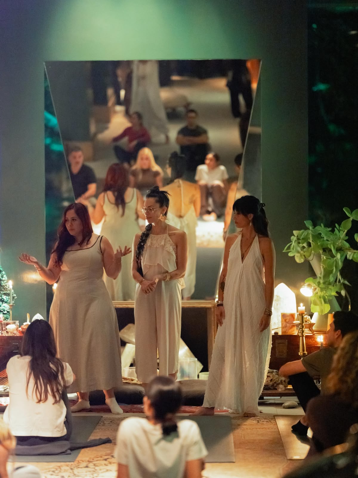 Three women facilitating in sacred ceremony