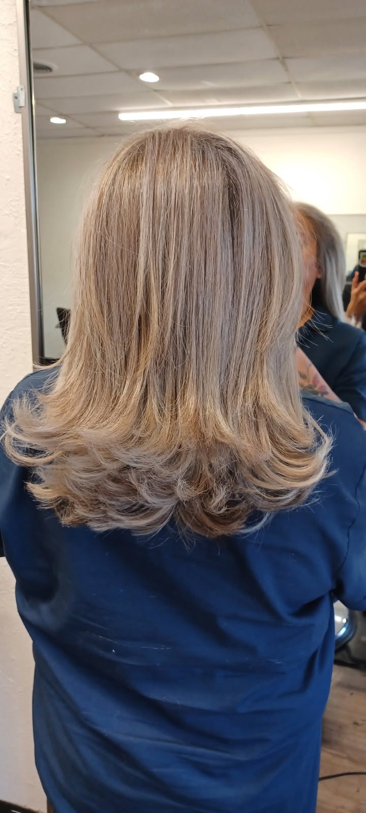 Champagne Blonde Layered Blowout & Flip Ends