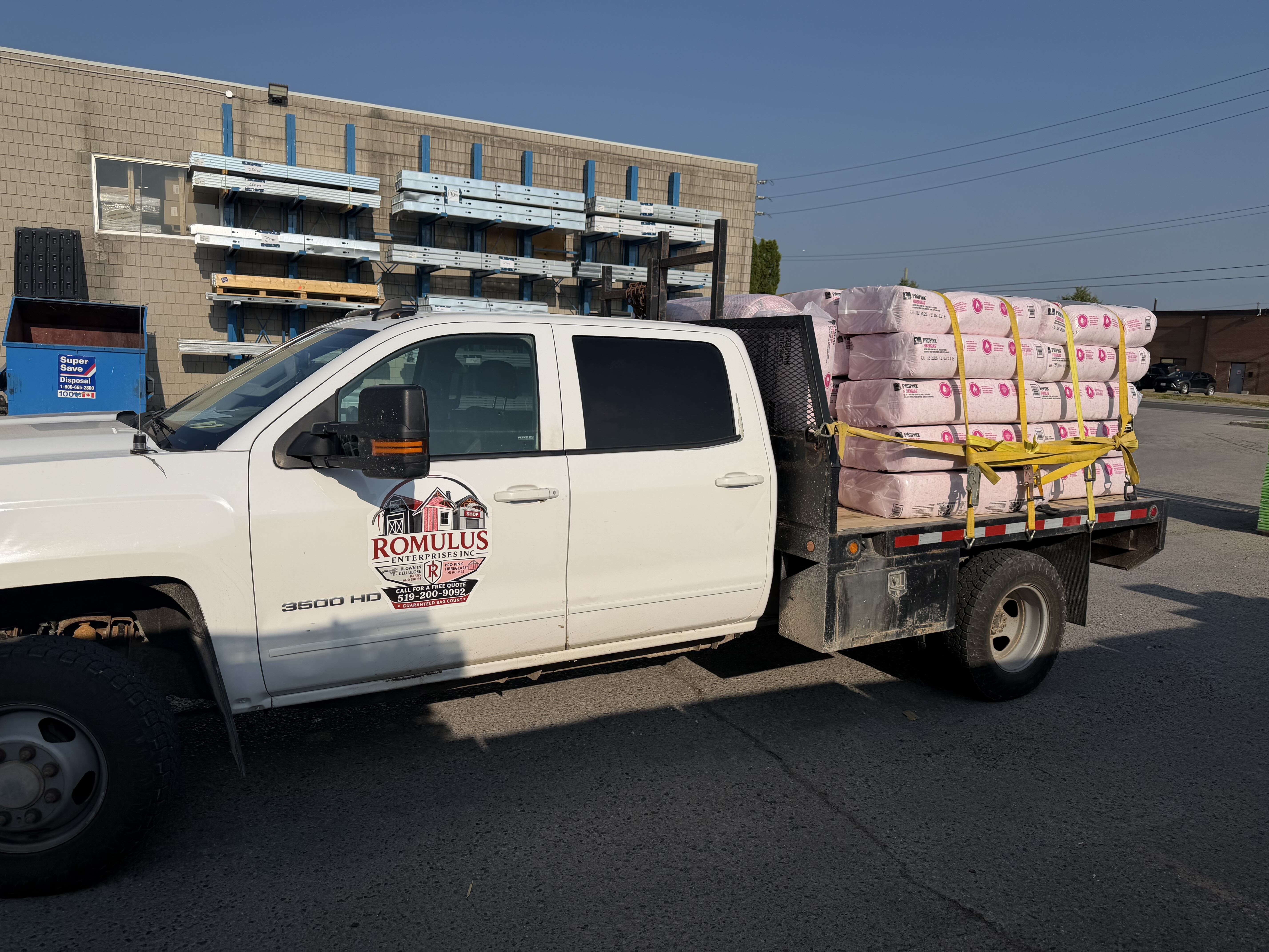 Romulus Enterprises truck loaded with ProPink insulation