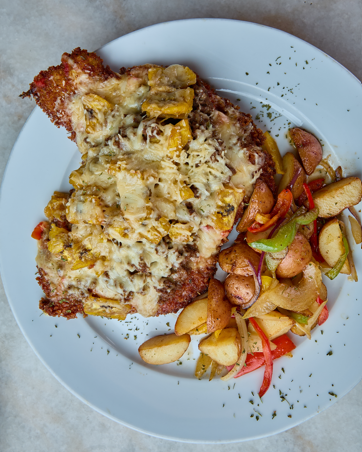 PECHUGA A LA PARMESANA