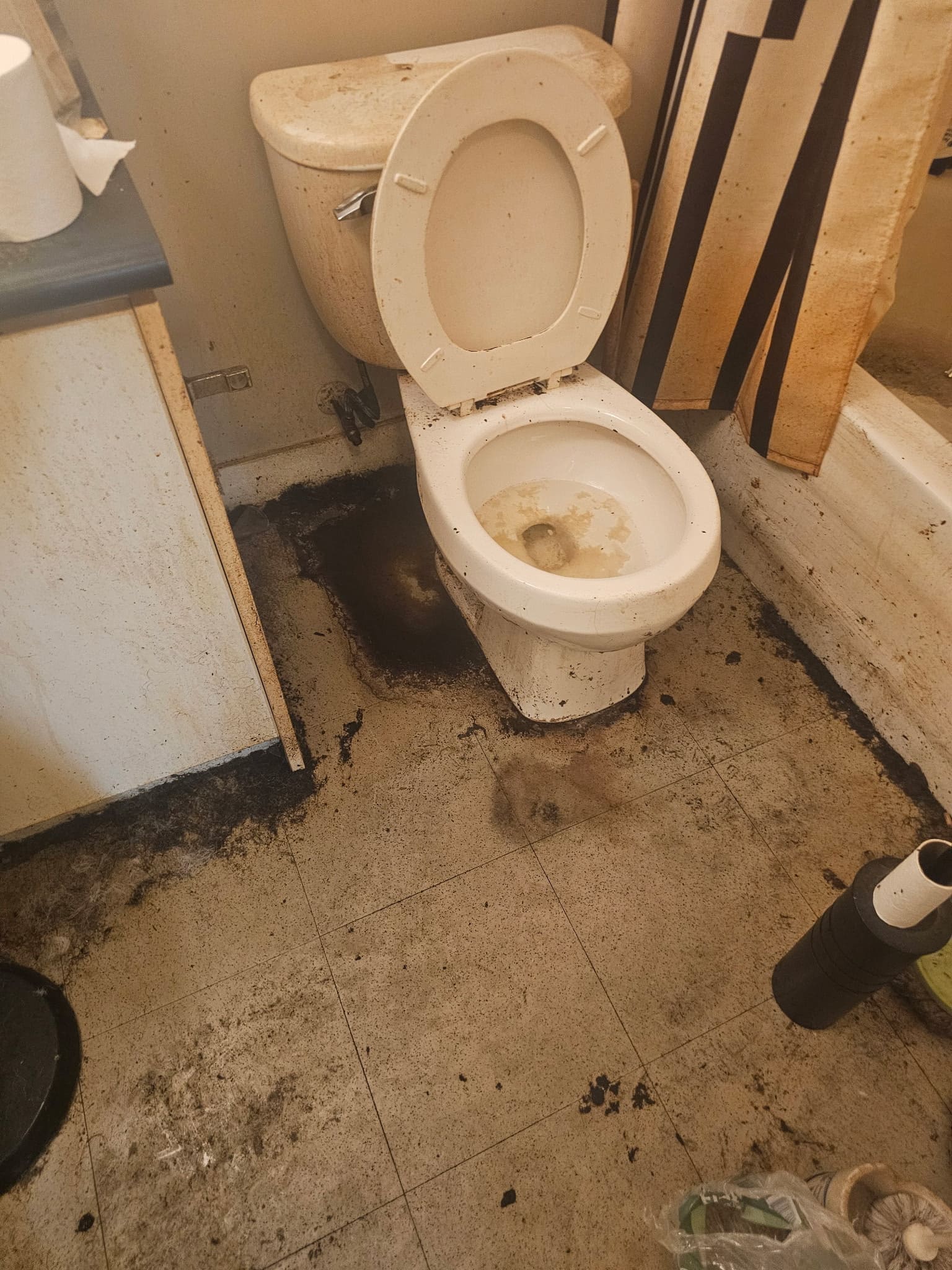 Heavily soiled bathroom floor before extreme cleaning in Toronto