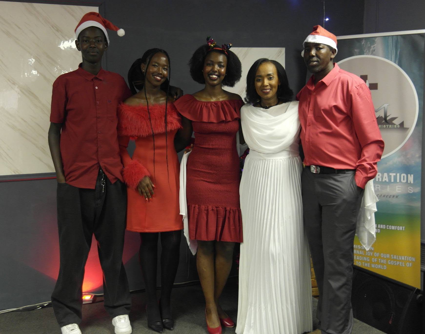Pastor Catherine with husband Pastor Daniel and family