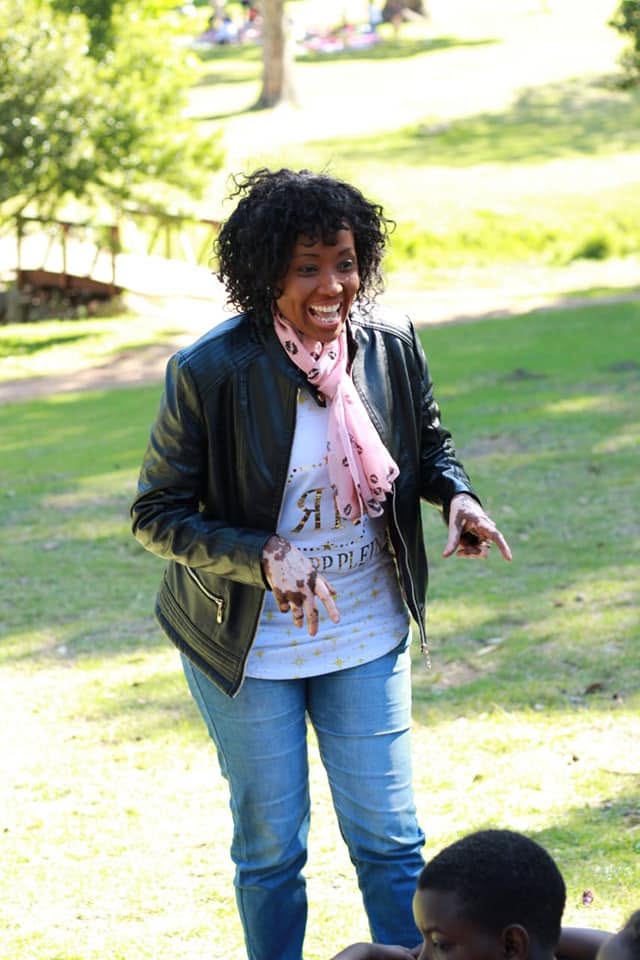 Pastor Catherine in an outdoor mentorship and counseling fellowship setting