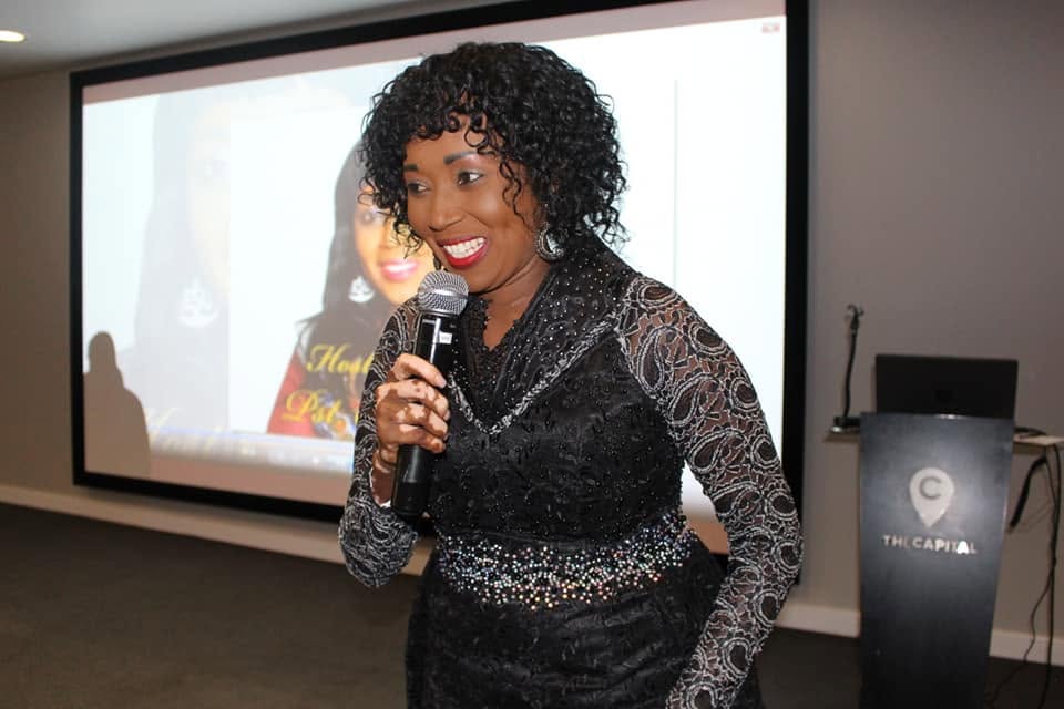 Pastor Catherine speaking at a Destiny Connectors women's leadership event