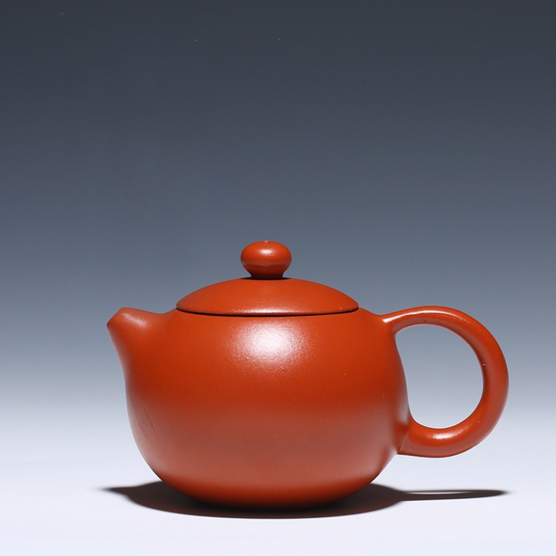 Tetera Xi Shi tradicional de arcilla roja Zisha con cuerpo redondo