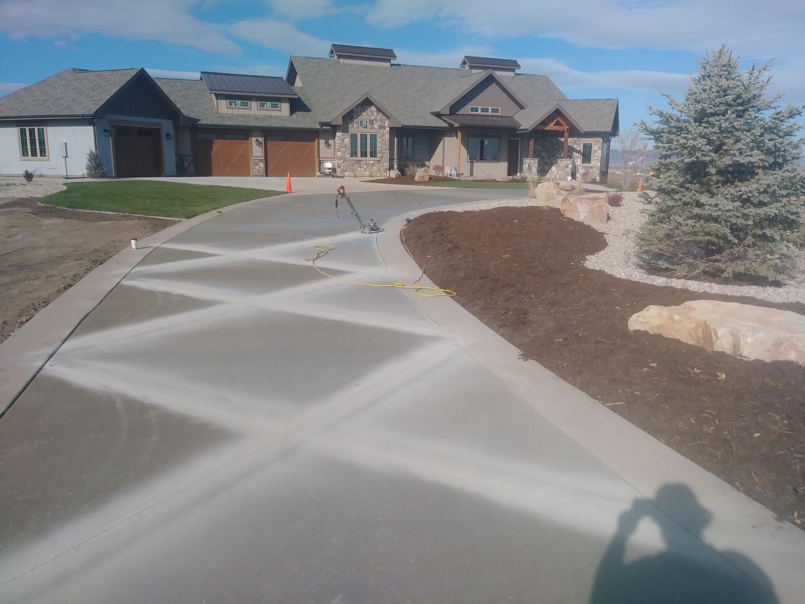 Custom Estate Concrete Driveway with Geometric Saw-Cut Diamond Patterns in Prosper TX by Happy's Concrete