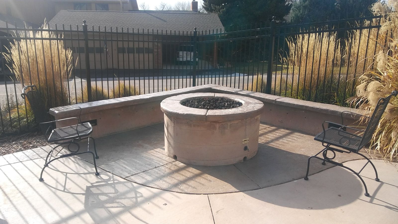 Circular Fire Pit & Curved Concrete Bench