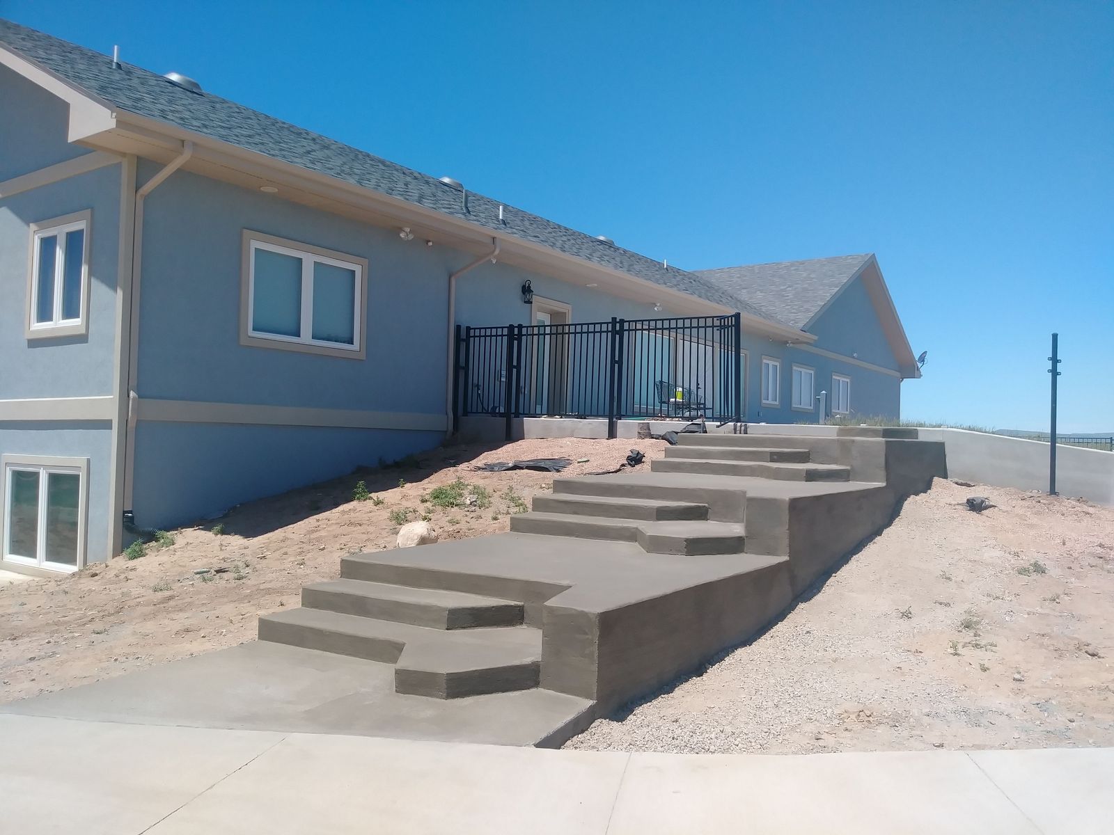 Side View Hillside Multi-Tier Walkway with Security Railing