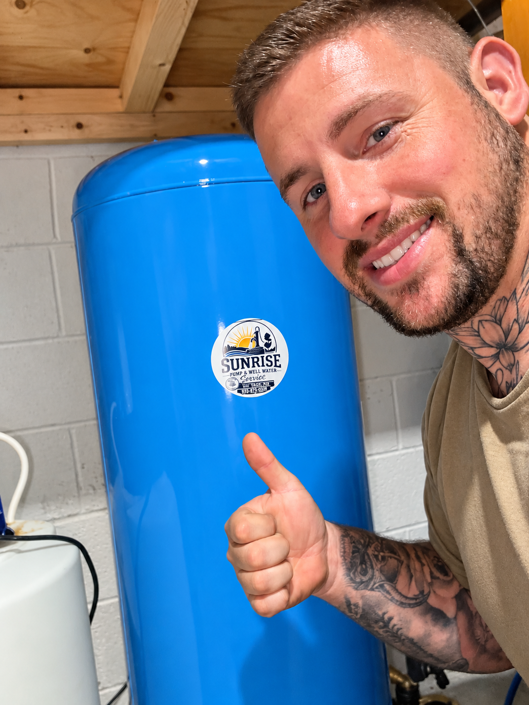 Sunrise Pump & Well Water Service — newly installed well pressure tank in a Sussex County home