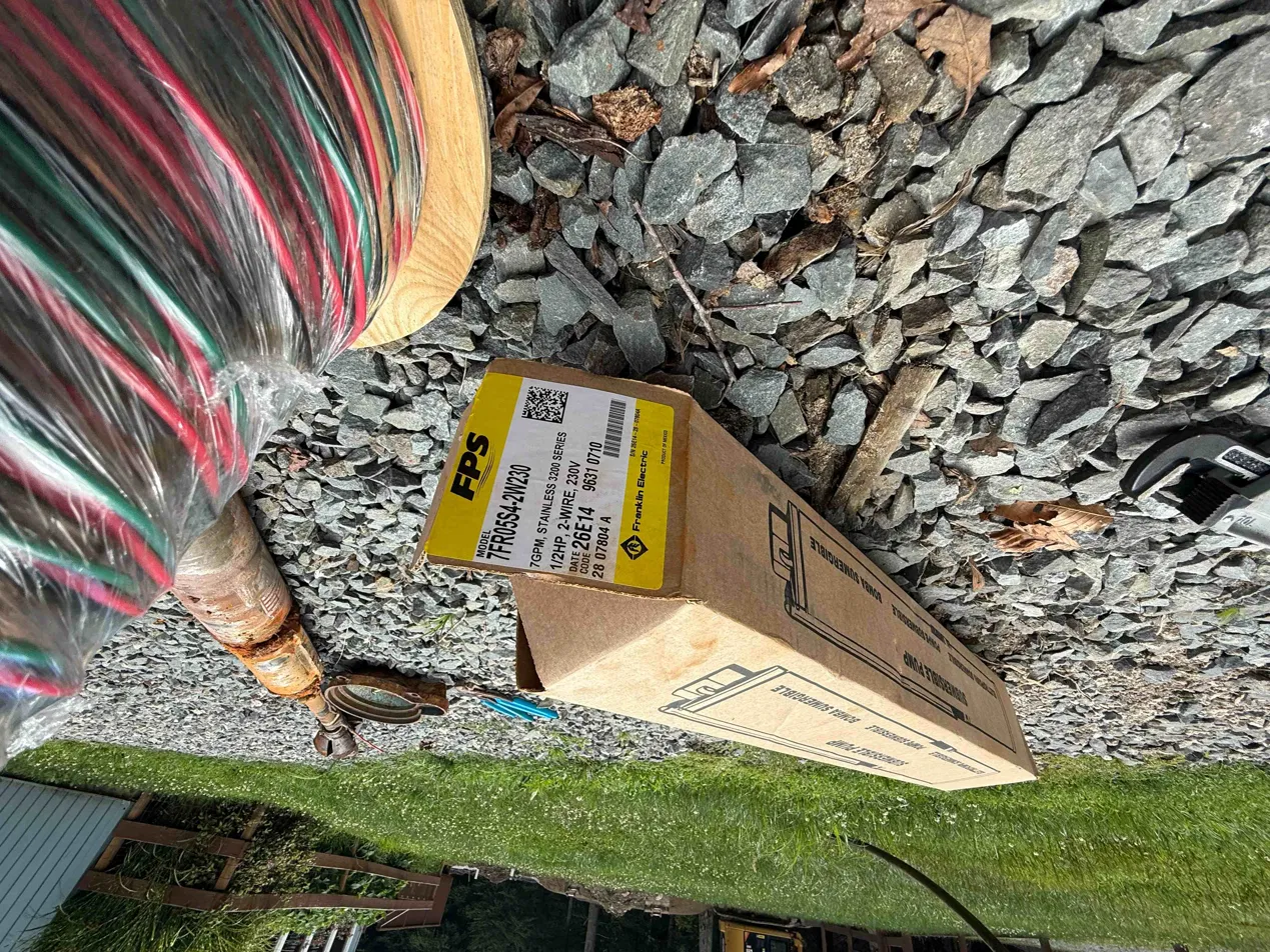 New submersible pump and well wire on site before installation — Sunrise Pump & Well Water Service