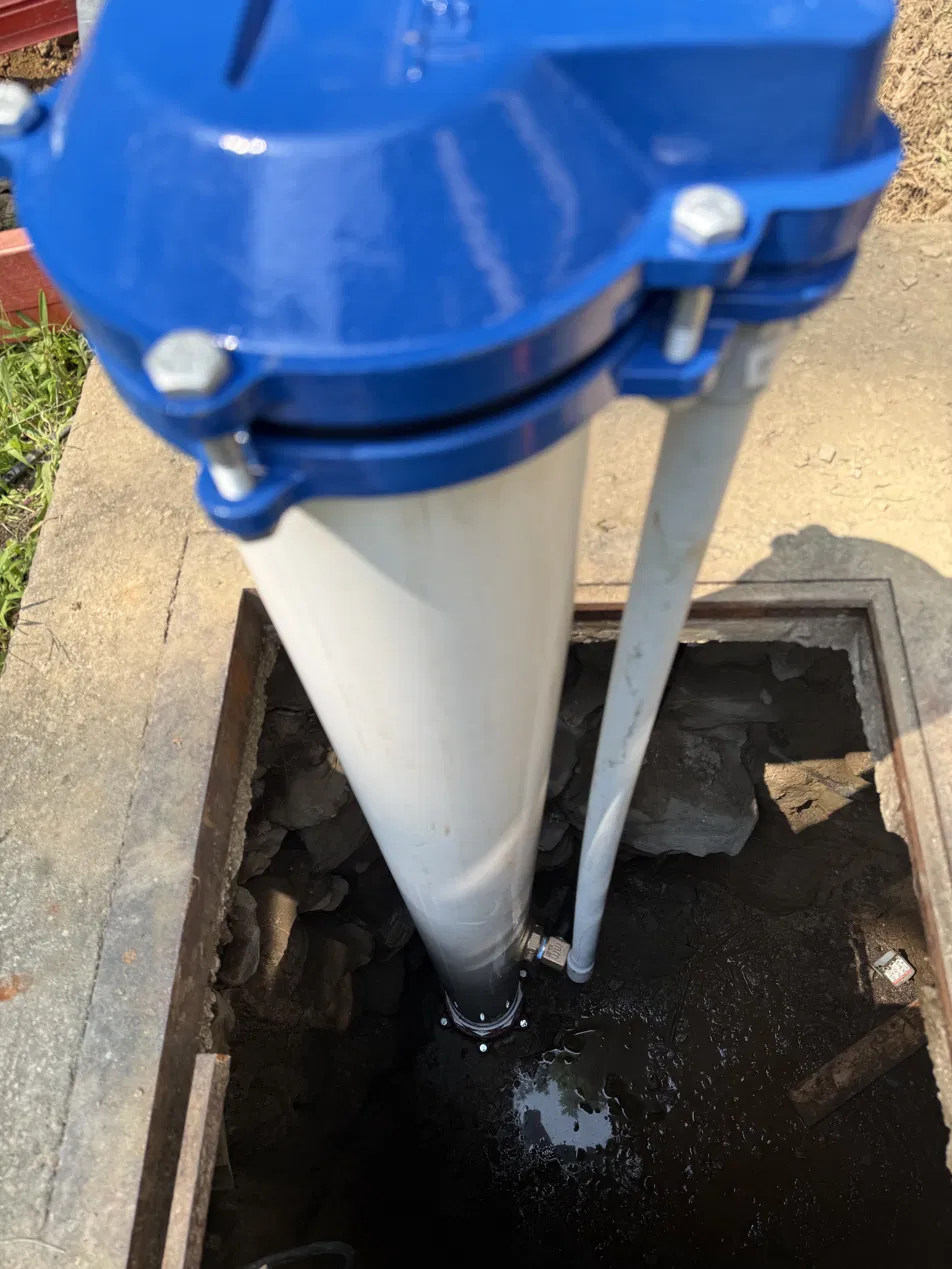 Pressure tank relocated inside the home on a new platform — Sunrise Pump & Well Water Service
