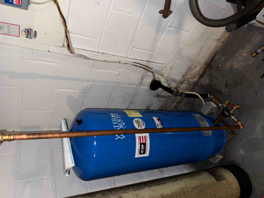 New Water Worker pressure tank installed with copper piping — Sunrise Pump & Well Water Service