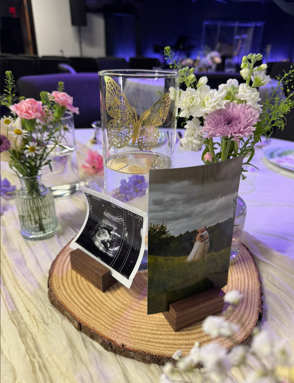 Wood Slice Sonogram & Wildflower Centerpiece