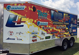 Custom enclosed trailer vinyl wrap completed by Crystal Coast Graphics
