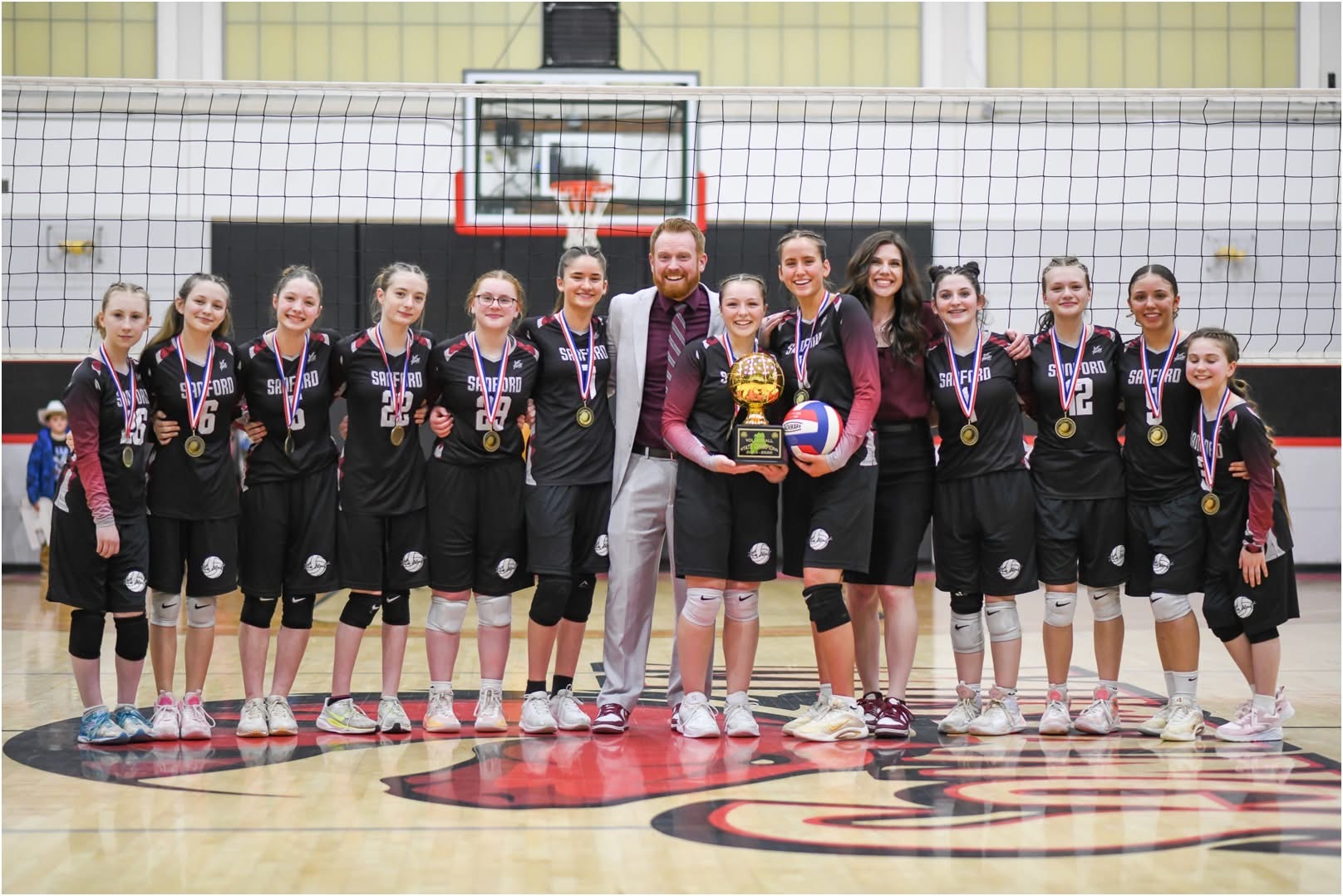 SCA Volleyball State Champions Team with Coaches and Trophy