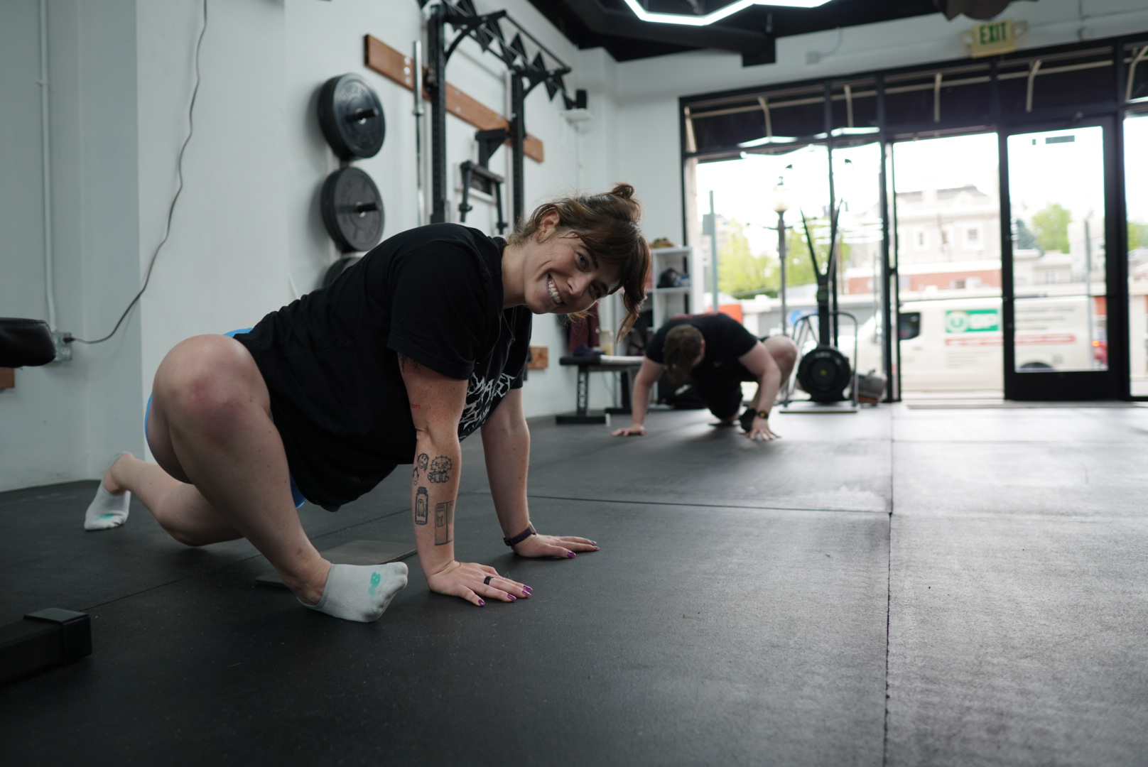 Members working through warmup and mobility drills together at Project 13 Gyms