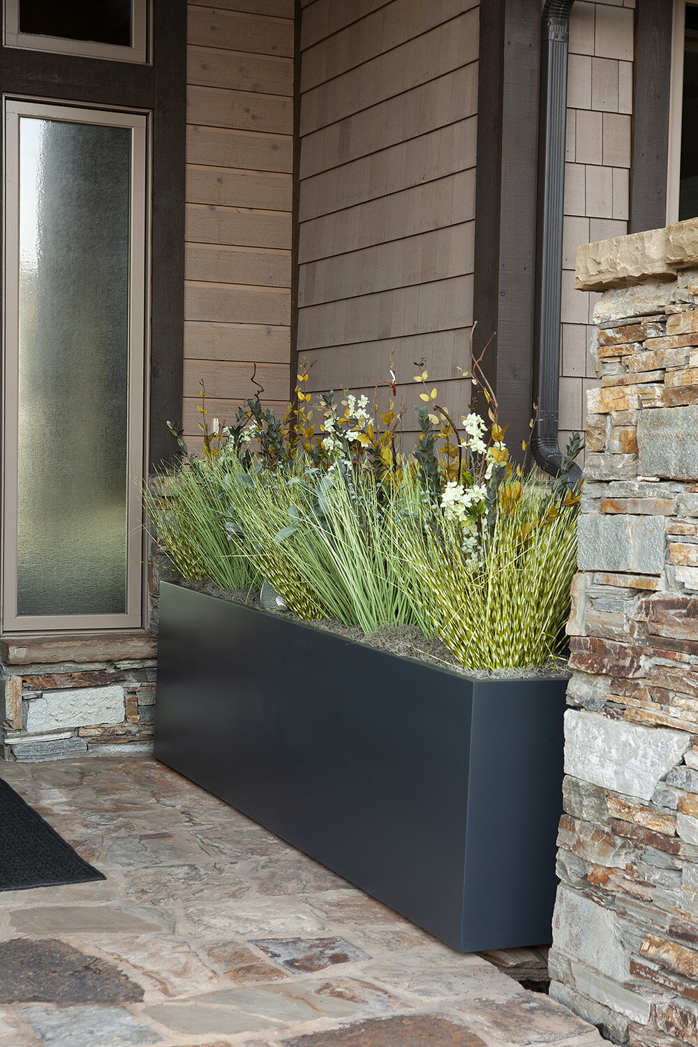 Composition 40 — Exterior plantscaping installation by Rikka Floral
