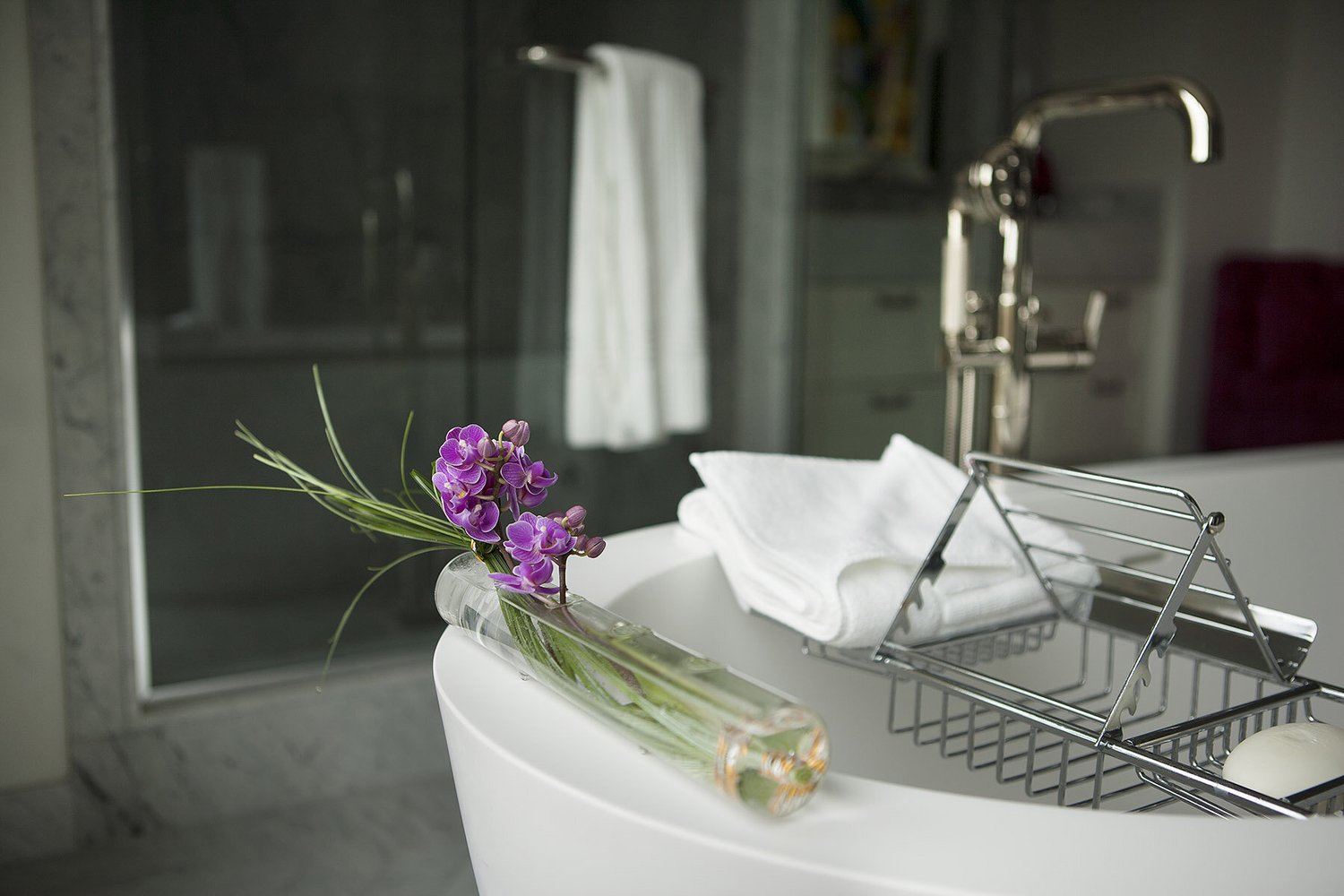 Sculptural floral and botanical design in an artisan vessel by Rikka Floral