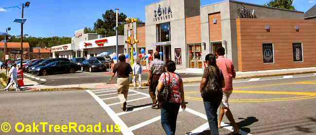Shoppers walking along Oak Tree Road in Edison, New Jersey