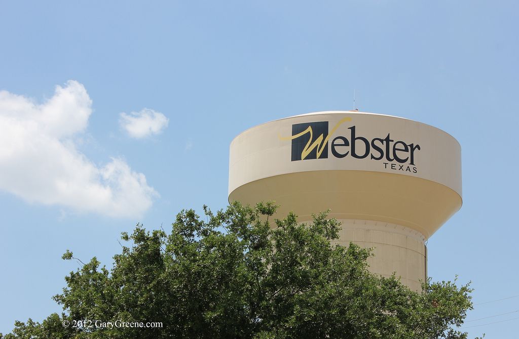 Webster Texas municipal water tower landmark against clear sky