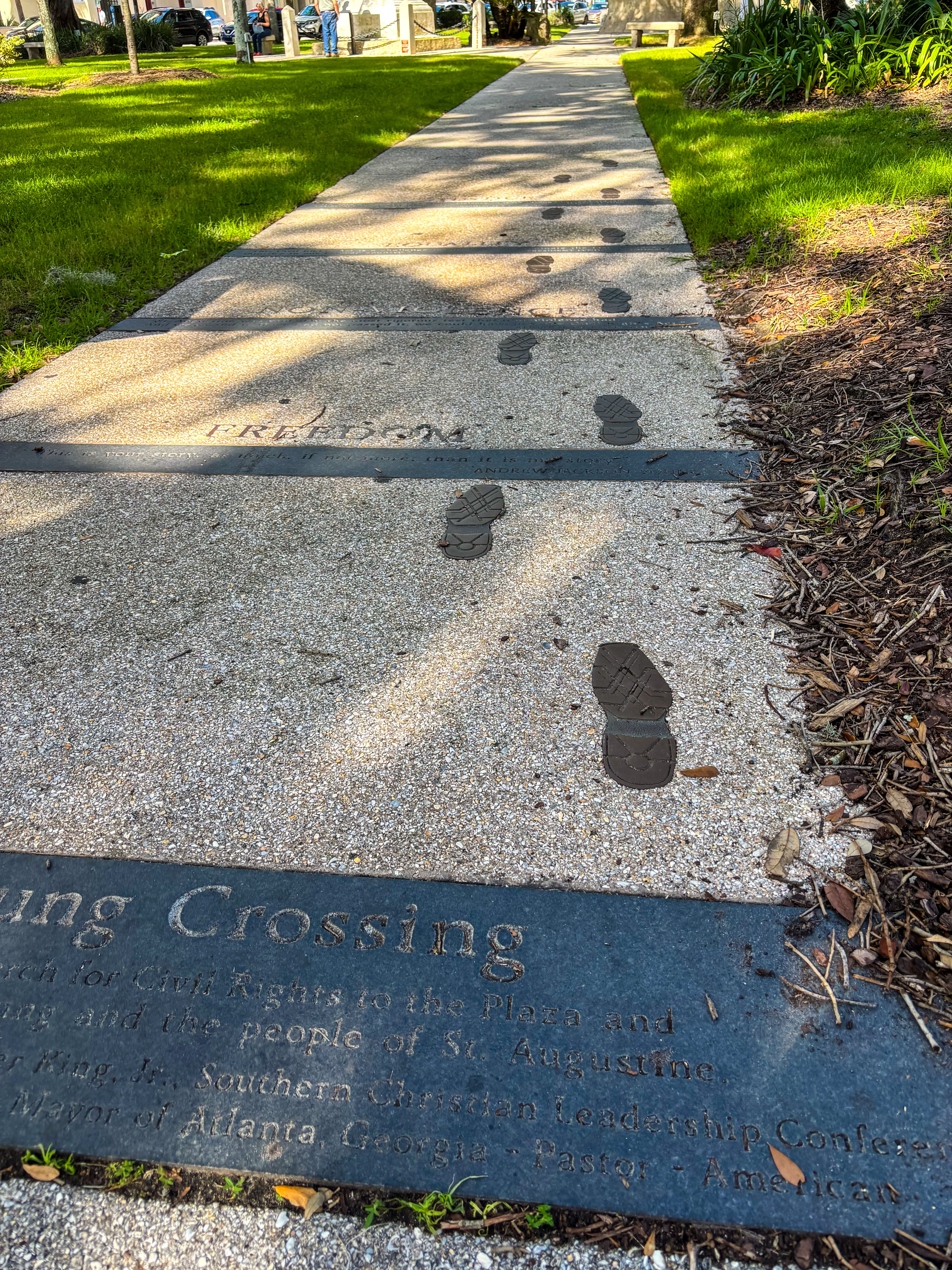 Andrew Young Crossing memorial path with bronze footsteps in Plaza de la Constitución