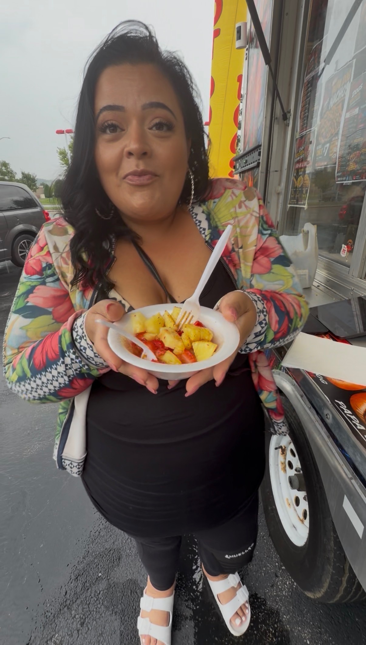 Customer smiling with a fresh Papa Dogs fruit bowl